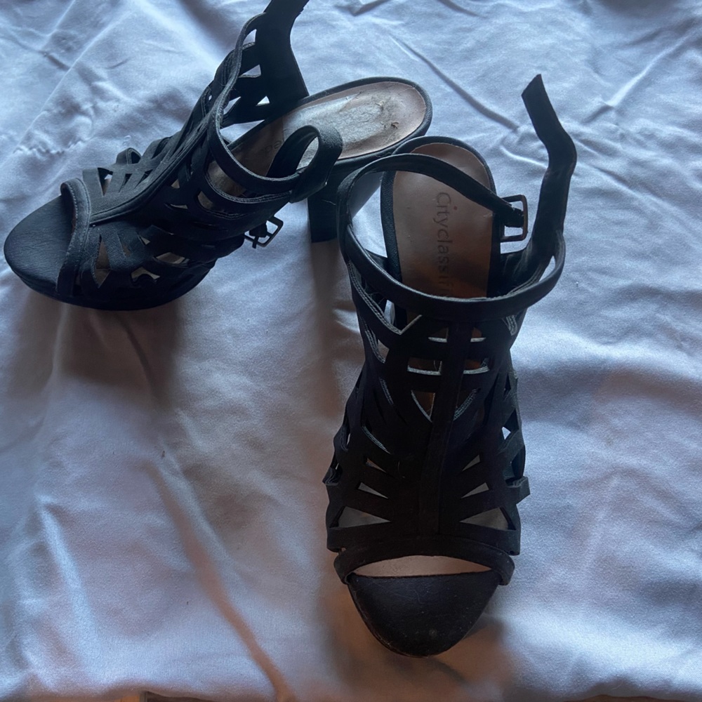 Small black heel. Worn once. Size 5.5